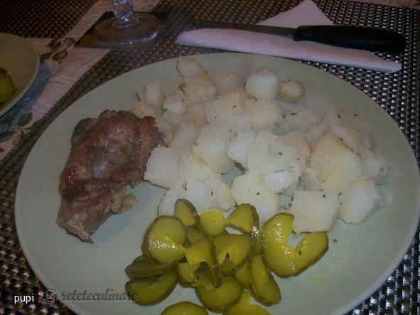 Imagine Reteta culinara Costite cu Usturoi si Rosmarin | 2review.ro