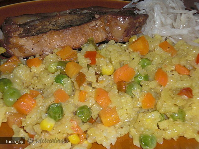 Imagine Reteta culinara Cotlet de Porc si Orez cu Legume | 2review.ro