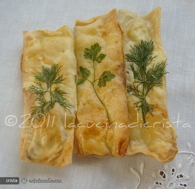 Imagine Reteta culinara Rulouri din Foi de Placinta cu Brinza Sarata si Marar | 2review.ro