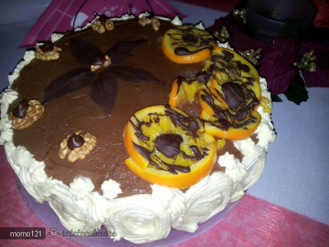 Imagine Reteta culinara Tort de ciocolata, portocale si nuci pentru o dubla aniversare | 2review.ro