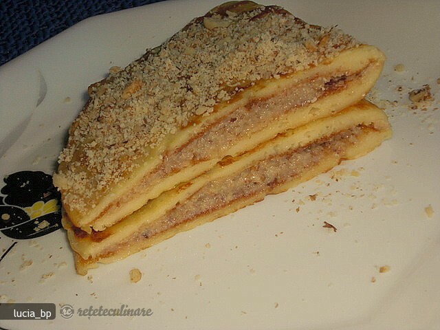 Imagine Reteta culinara Clatite Rusesti cu Umplutura de Nuca | 2review.ro