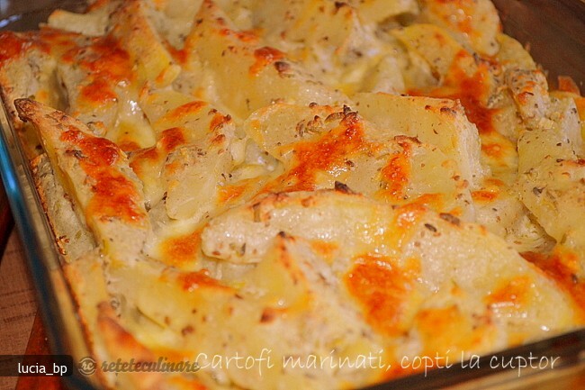 Imagine Reteta culinara Cartofi Marinati, Copti la Cuptor | 2review.ro