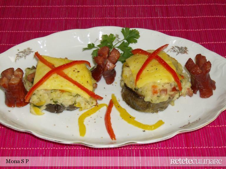 Imagine Reteta culinara Musuroi de orez pe pat de vinete | 2review.ro