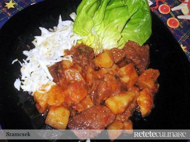 Imagine Reteta culinara Tocanita de vitel in sos de vin si cartofi | 2review.ro