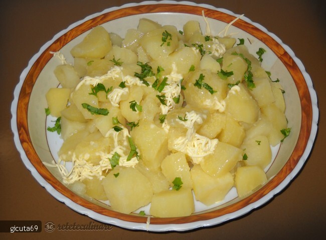 Imagine Reteta culinara Peste la cuptor cu garnitura de cartofi natur | 2review.ro